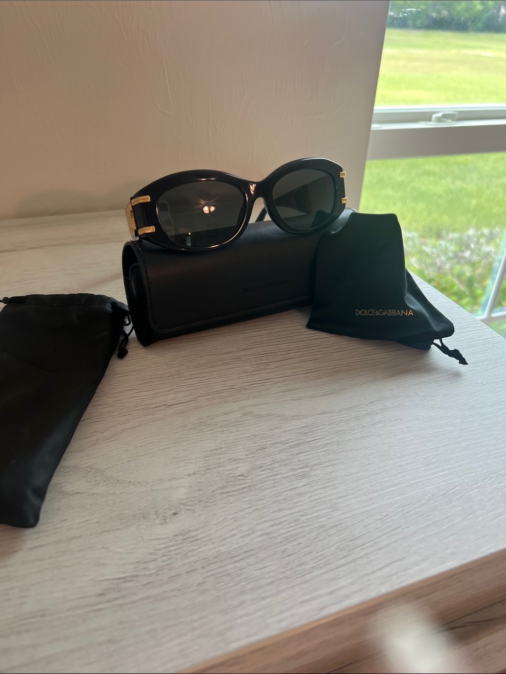 Dolce & Gabbana Black Sunglasses with Gold Hardware